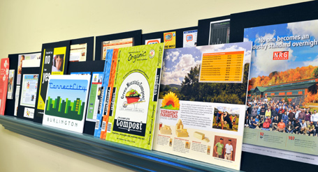 A taste of the good stuff from our work portfolio, displayed on conference room shelf A taste of the good stuff from our work portfolio, displayed on conference room shelf