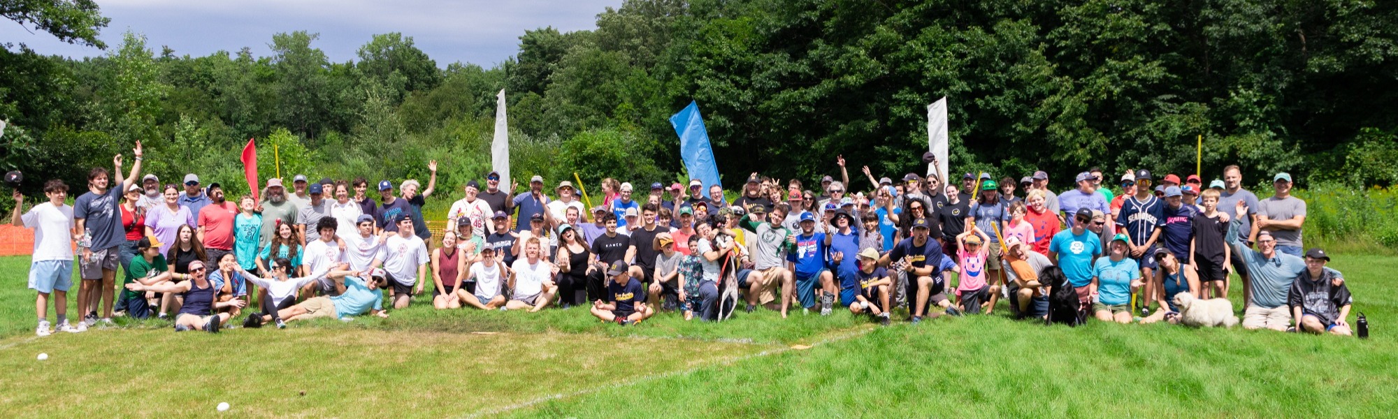 All Wiffle Fest players pose together on the fields at Rock Point School to take a group photo