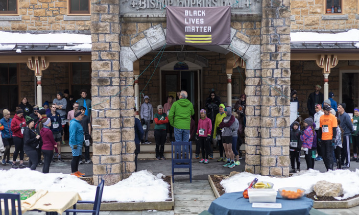 C.J. Spirito, Head of School at Rock Point School, addresses the Maple Run runners before the race in front of Rock Point School.