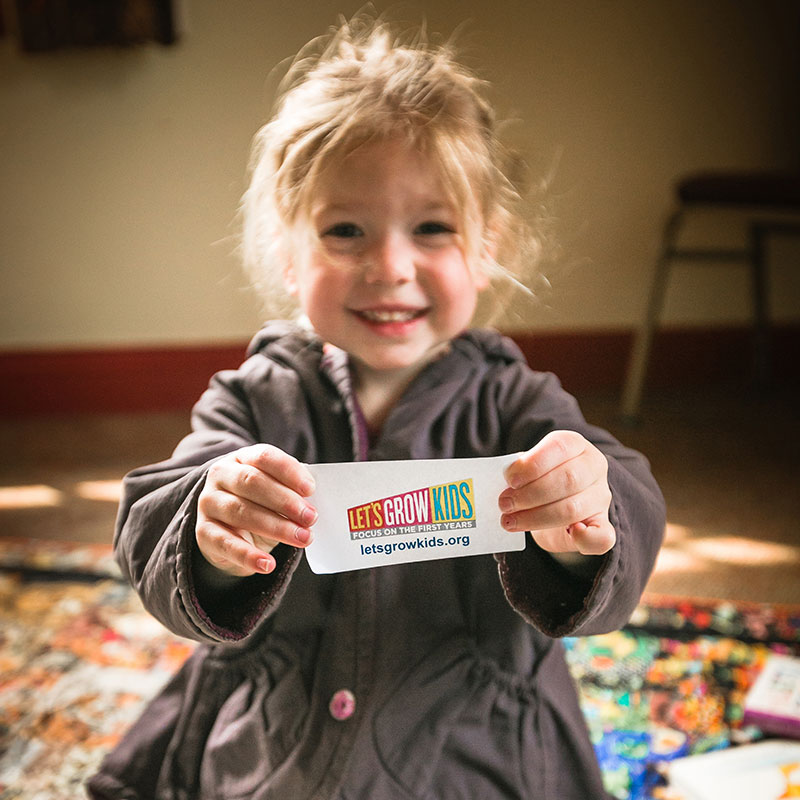 Girl-with-sticker-800x800